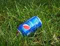 Teplyk, Ukraine - October 01, 2022: Pepsi can on green grass