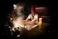 May, 2018 - Ari Atoll, Maldives: Happy teppanyaki chef cooking vegetables at teppan in a Japanese steakhouse on Mishi Sushi