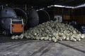 In the tequila factory there is a lot of agave and large ovens.