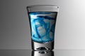 Glass cup for blue tequila Royalty Free Stock Photo