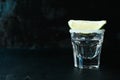 Tequila shot with lime and salt against black background Royalty Free Stock Photo