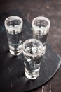 Tequila shots on the dark rustic background Royalty Free Stock Photo