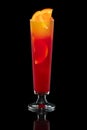 Tequila sunrise cocktail and orange isolated on black with clipping path Royalty Free Stock Photo
