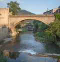 The Ter river and old bridge in Ripoll town