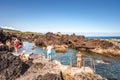 Terceira, Azores PORTUGAL - 3 August 2020 - Real people in summer in the Biscoitos natural sea pools