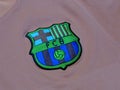 Terengganu, Malaysia - 14 January 2023 : Football club barcelona logo on pink t-shirt