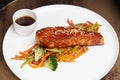 Teriyaki salmon on white plate. Salmon Teriyaki Royalty Free Stock Photo