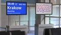 WIZZ AIR flight from Birmingham international airport to Krakow. Editorial 3d rendering
