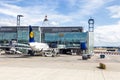 Terminal 1 with passengers airplane decking in Frankfurt