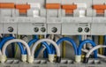 Terminals, contacts, circuit breakers wiring in electrical switchboard providing a safe supply of electricity Royalty Free Stock Photo