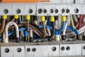 Terminals, contacts, circuit breakers wiring in electrical switchboard providing a safe supply of electricity