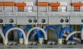 Terminals, contacts, circuit breakers wiring in electrical switchboard providing a safe supply of electricity Royalty Free Stock Photo
