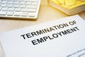 Termination of Employment on a desk. Royalty Free Stock Photo