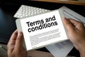 Terms and conditions businessman reviewing  terms and conditions of agreement office terms and conditions Royalty Free Stock Photo