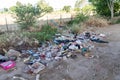 illegal waste dumped by uncivilized people on the outskirts of the city