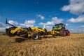 TERNOPIL REGION, UKRAINE - August 10, 2021: tractor with disc harrow Bednar Actros RO 4000R in operation at the demonstration of