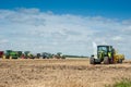 TERNOPIL REGION, UKRAINE - August 10, 2021: tractor with disc harrow, soil cultivation system in operation at the demonstration of