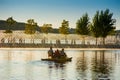 TERNOPIL REGION, UKRAINE - September 5, 2019 - beautiful fountains on the background of a catamaran floating on a pond