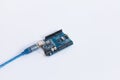 TERNOPIL, UKRAINE - APRIL 19, 2019: Arduino Uno. Micro controller. Technology. Development platform connected to PC with a USB Royalty Free Stock Photo