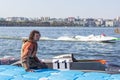 Italian pilot of a water-motor car at the finish Royalty Free Stock Photo