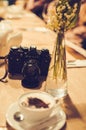 Ternopil, Ukraine. 04,04,2013 - Cup of coffee with foam of mammoth image in cafe and zenit camera.