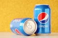 TERNOPIL, UKRAINE - MAY 28, 2022: Cold Pepsi drink cans. Pepsi is a carbonated soft drink produced by PepsiCo Royalty Free Stock Photo