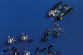TERNOPIL, UKRAINE - May 5, 2019: DIY electronic kit on the blue background, FLAT LAY, variety of sensor and tools with copy space