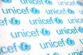 TERNOPIL, UKRAINE - MAY 2, 2022: Unicef logo on paper. Unicef is a United Nations programm that provides humanitarian and Royalty Free Stock Photo