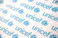 TERNOPIL, UKRAINE - MAY 2, 2022: Unicef logo on paper. Unicef is a United Nations programm that provides humanitarian and Royalty Free Stock Photo