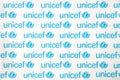 TERNOPIL, UKRAINE - MAY 2, 2022: Unicef logo on paper. Unicef is a United Nations programm that provides humanitarian and Royalty Free Stock Photo