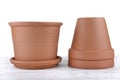 Terra cotta flower pots empty on a table background