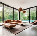 Terra cotta leather sofa in minimalist room with swimming pool in patio view. Interior design of modern living room in luxury Royalty Free Stock Photo