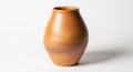 A terra cotta vase with a smooth, rounded shape stands on a plain white background Royalty Free Stock Photo