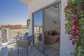 Terrace balcony with chairs in tropical luxury apartment resort Royalty Free Stock Photo