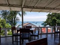 Terrace balcony restaurant thailand tropical chairs seat roof on top view asia sea ocean beach ships port thailand samui