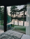 Terrace with chairs at country side house, waterfront vacation hotel. Royalty Free Stock Photo