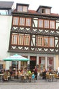 Families at a terrace in fackwerk style in Eisenach, Thuringia, Germany