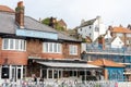 The terrace of the Fleece pub, or bar, overlooking the harbour in Whitby, North Yorkshire, UK Royalty Free Stock Photo