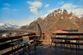 Terrace of a house in a village in the mountains. Breathtaking views of the snow-capped mountains