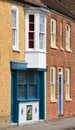 Terrace Housing and Colourful Tiled Butchers Shop Front