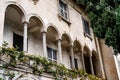 Terrace with ivy-covered arches. Villa Monastero, Italy Royalty Free Stock Photo