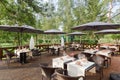 Terrace restaurant in the park, with a table setting Royalty Free Stock Photo