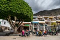 The terrace of the restaurant with the visitors in the city centre. Selective focus. 20.01.2020 Los Gigantes, Tenerife
