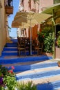 Terrace on a stairway in a narrow street Royalty Free Stock Photo