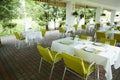 Terrace summer cafe with tables and chairs for people, an empty institution for recreation, nobody Royalty Free Stock Photo