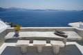 Terrace with table on the sea Oia - Santorini Island - Aegean sea - Greece Royalty Free Stock Photo