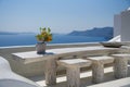 Terrace with table on the sea Oia - Santorini Island - Aegean sea - Greece Royalty Free Stock Photo