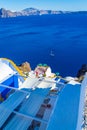 Picturesque terrace in Oia town Santorini and Caldera seascape Greece Royalty Free Stock Photo