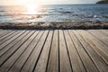 Terrace view sea with empty wooden table top on the beach landscape nature with sunset or sunrise - wooden board balcony view Royalty Free Stock Photo