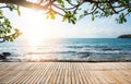 Terrace view sea with empty wooden table top on the beach landscape nature with sunset or sunrise - wooden bridge balcony view